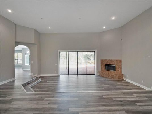 Empty room, Fireplace, Interior, Recessed Lighting, Wood Texture Flooring
