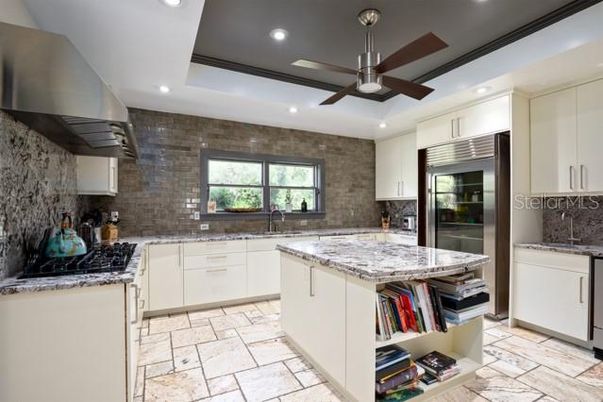 Interior, Kitchen, Recessed Lighting, Stainless Steel Appliances, Stone Walls