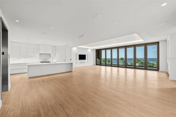 Interior, Kitchen, Marble Walls, Recessed Lighting, Water, Wood Texture Flooring