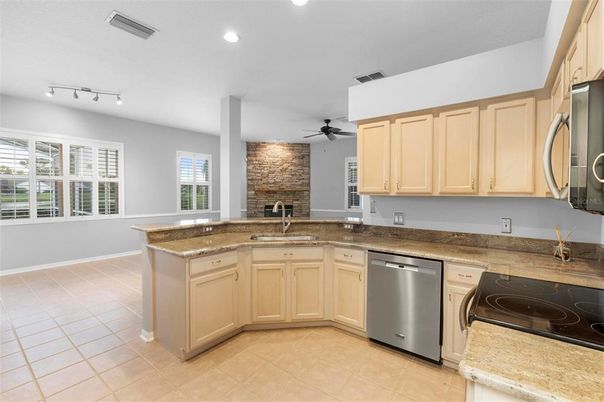 Fireplace, Interior, Kitchen, Recessed Lighting, Stone Walls