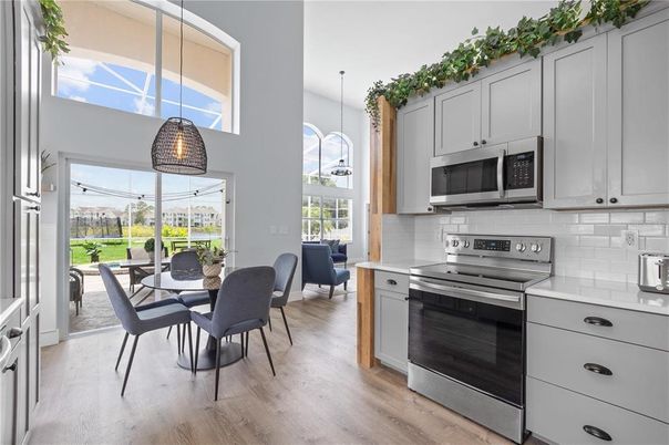 Dining room, Interior, Kitchen, Pendant Lights, Stainless Steel Appliances, Wood Texture Flooring