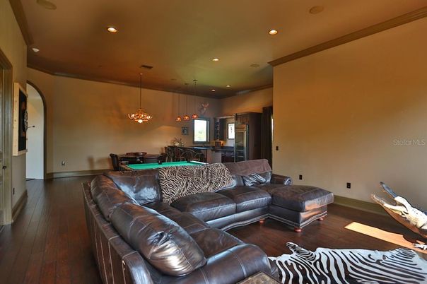 Billiard Table, Dining room, Game Room, Interior, Living room, Pendant Lights, Recessed Lighting, Wood Texture Flooring