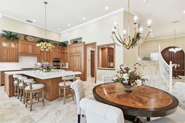 Chandelier, Dining room, Interior, Kitchen, Pendant Lights, Recessed Lighting, Stainless Steel Appliances