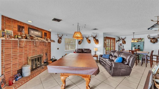 Dining room, Fireplace, Interior, Living room, Pendant Lights, Recessed Lighting, Stone Walls