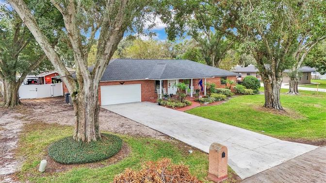 Attached, Backyard, Exterior, Facade, Brick Facade, Ranch