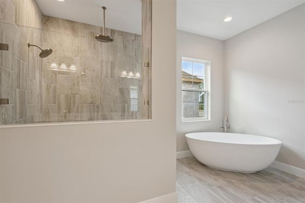 Bathroom, Free Standing Baths, Glass Shower, Interior, Pendant Lights, Recessed Lighting, Wood Texture Flooring