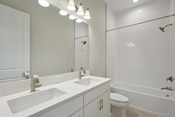 Bathroom, Dual Sink Vanities, Interior, Recessed Lighting, Wood Texture Flooring