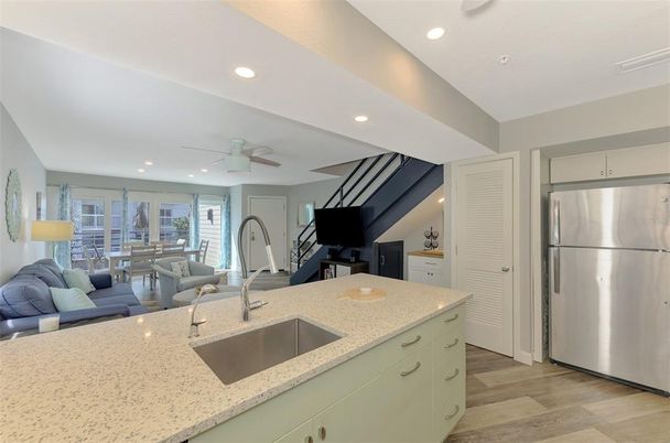 Dining room, Interior, Kitchen, Living room, Recessed Lighting, Stainless Steel Appliances, Wood Texture Flooring