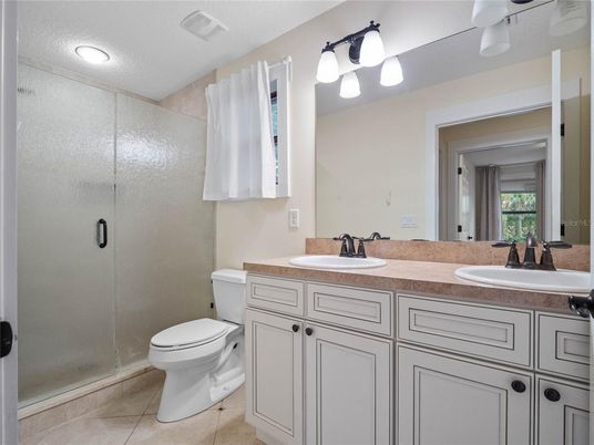 Bathroom, Dual Sink Vanities, Glass Shower, Interior, Recessed Lighting
