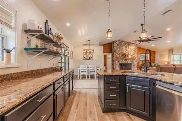 Dining room, Fireplace, Interior, Kitchen, Pendant Lights, Recessed Lighting, Stone Walls, Wood Texture Flooring