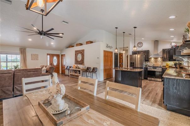 Dining room, Interior, Kitchen, Pendant Lights, Recessed Lighting, Stainless Steel Appliances, Wood Texture Flooring