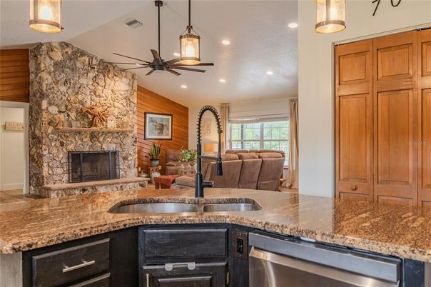 Fireplace, Interior, Kitchen, Pendant Lights, Recessed Lighting, Stone Walls
