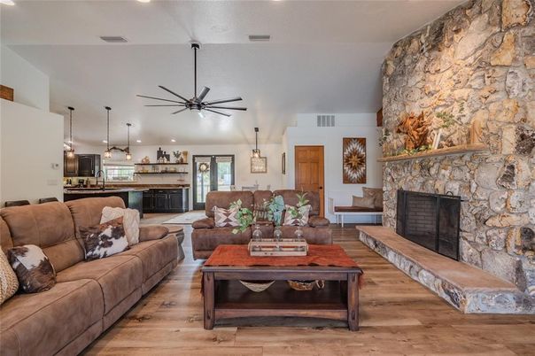Fireplace, Interior, Kitchen, Living room, Pendant Lights, Recessed Lighting, Stone Walls, Wood Texture Flooring