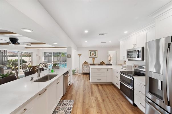Interior, Kitchen, Recessed Lighting, Stainless Steel Appliances, Wood Texture Flooring