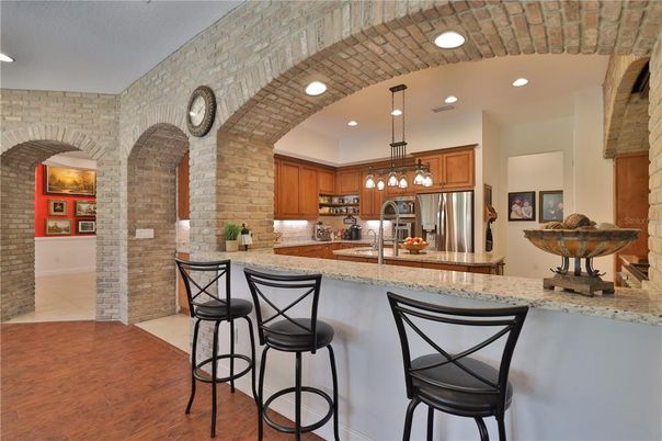 Interior, Kitchen, Pendant Lights, Recessed Lighting, Stainless Steel Appliances, Stone Walls, Wood Texture Flooring
