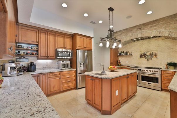 Interior, Kitchen, Pendant Lights, Recessed Lighting, Stainless Steel Appliances, Stone Walls