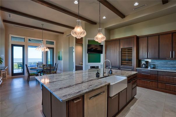 Chandelier, Dining room, Interior, Kitchen, Pendant Lights, Recessed Lighting, Stainless Steel Appliances, Water, Wooden Beams