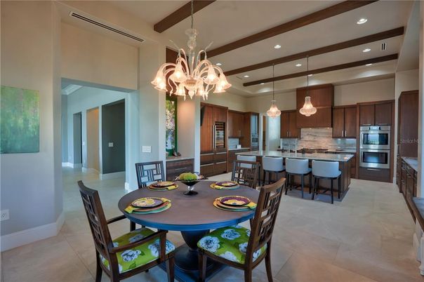 Chandelier, Dining room, Interior, Kitchen, Pendant Lights, Recessed Lighting, Stainless Steel Appliances, Wooden Beams