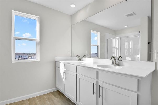 Bathroom, Dual Sink Vanities, Interior, Recessed Lighting, Wood Texture Flooring
