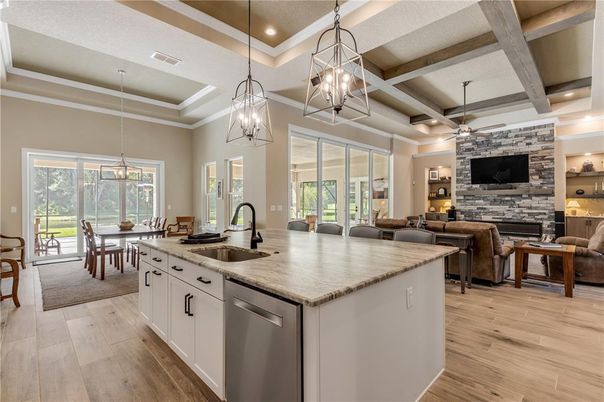 Dining room, Fireplace, Interior, Kitchen, Living room, Pendant Lights, Recessed Lighting, Stone Walls, Wooden Beams, Wood Texture Flooring