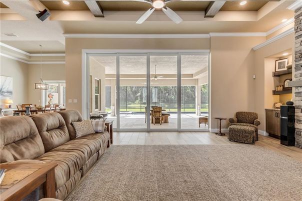 Dining room, Interior, Living room, Pendant Lights, Recessed Lighting, Wooden Beams, Wood Texture Flooring