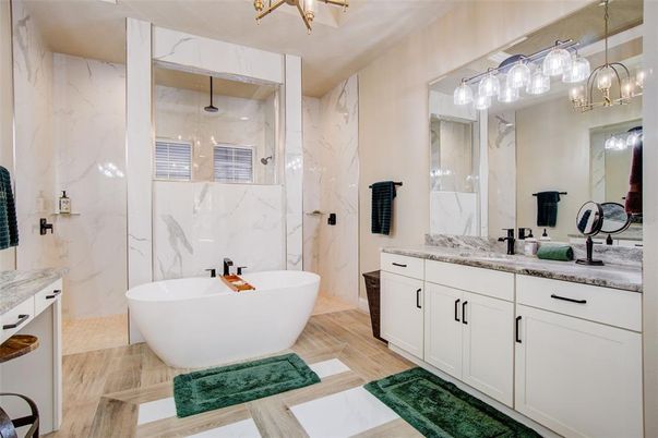 Bathroom, Dual Sink Vanities, Free Standing Baths, Interior, Marble Walls, Pendant Lights, Wood Texture Flooring
