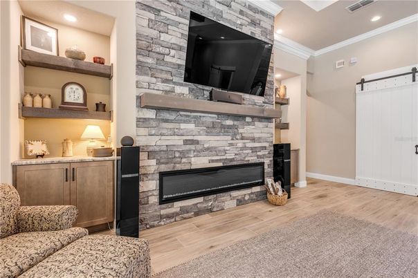 Fireplace, Interior, Recessed Lighting, Stone Walls, Wood Texture Flooring
