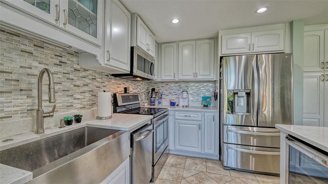 Interior, Kitchen, Recessed Lighting, Stainless Steel Appliances, Stone Walls