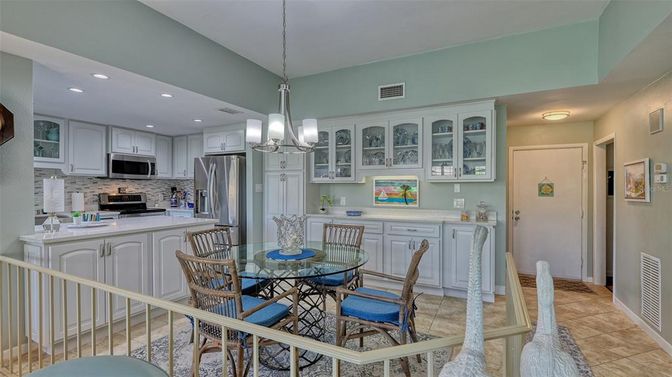 Chandelier, Dining room, Interior, Kitchen, Pendant Lights, Recessed Lighting, Stainless Steel Appliances