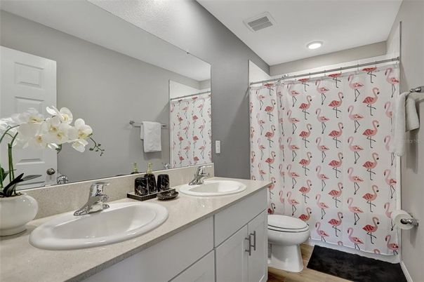 Bathroom, Dual Sink Vanities, Interior, Recessed Lighting, Wood Texture Flooring