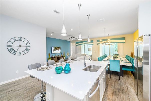 Dining room, Interior, Kitchen, Living room, Pendant Lights, Recessed Lighting, Stainless Steel Appliances, Wood Texture Flooring
