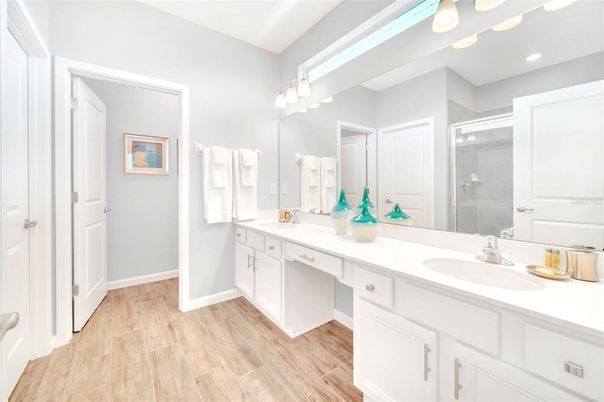Bathroom, Dual Sink Vanities, Interior, Recessed Lighting, Wood Texture Flooring