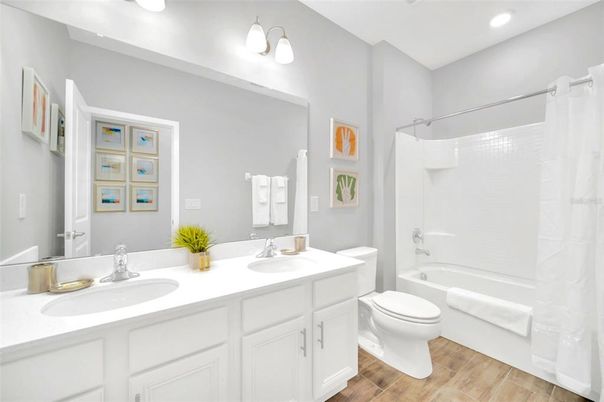 Bathroom, Dual Sink Vanities, Interior, Recessed Lighting, Wood Texture Flooring