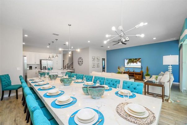 Dining room, Interior, Kitchen, Living room, Pendant Lights, Recessed Lighting, Stainless Steel Appliances, Wood Texture Flooring