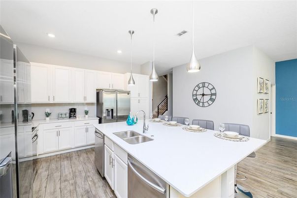 Interior, Kitchen, Pendant Lights, Recessed Lighting, Stainless Steel Appliances, Wood Texture Flooring