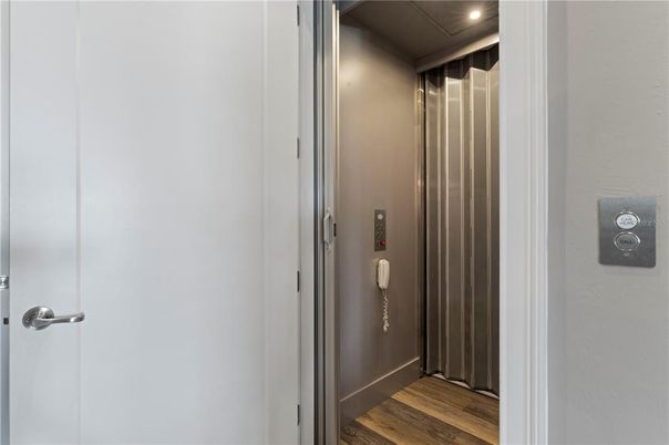 Elevator, Interior, Recessed Lighting, Wood Texture Flooring