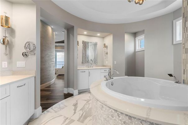 Bathroom, Dual Sink Vanities, Interior, Marble, Recessed Lighting, Wood Texture Flooring