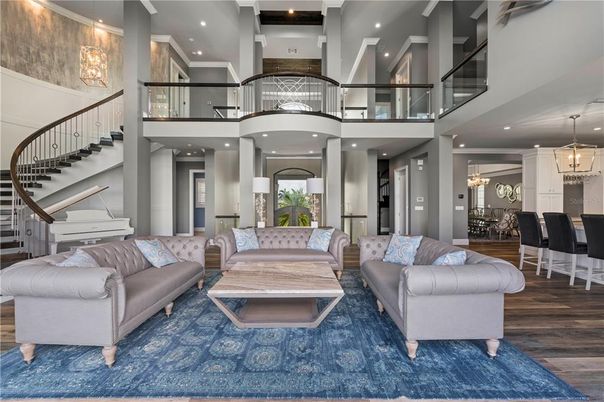 Chandelier, Dining room, Interior, Living room, Pendant Lights, Piano, Recessed Lighting, Wood Texture Flooring
