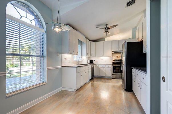 Interior, Kitchen, Pendant Lights, Stainless Steel Appliances, Wood Texture Flooring