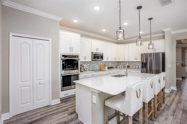 Interior, Kitchen, Pendant Lights, Recessed Lighting, Stainless Steel Appliances, Wood Texture Flooring