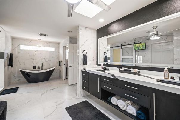 Bathroom, Dual Sink Vanities, Free Standing Baths, Glass Shower, Interior, Marble, Marble Walls, Recessed Lighting