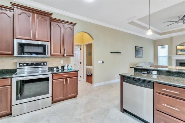 Fireplace, Interior, Kitchen, Pendant Lights, Stainless Steel Appliances