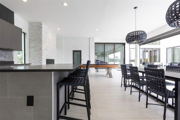 Dining room, Fireplace, Game Room, Interior, Pendant Lights, Recessed Lighting, Wood Texture Flooring