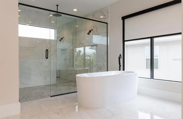 Bathroom, Free Standing Baths, Glass Shower, Interior, Marble, Marble Walls, Recessed Lighting