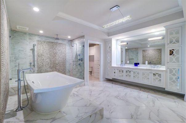 Bathroom, Dual Sink Vanities, Free Standing Baths, Glass Shower, Interior, Marble, Marble Walls, Pendant Lights, Recessed Lighting