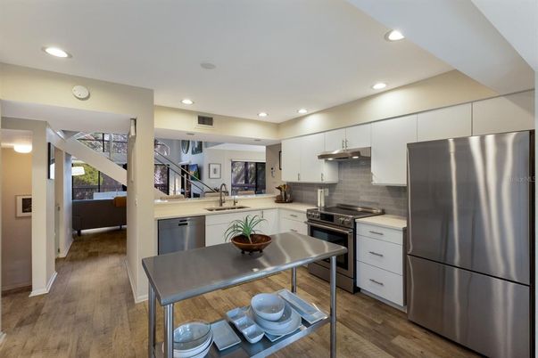 Interior, Kitchen, Recessed Lighting, Stainless Steel Appliances, Wood Texture Flooring