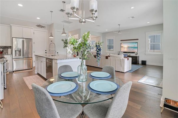 Dining room, Interior, Kitchen, Living room, Pendant Lights, Recessed Lighting, Stainless Steel Appliances, Wood Texture Flooring