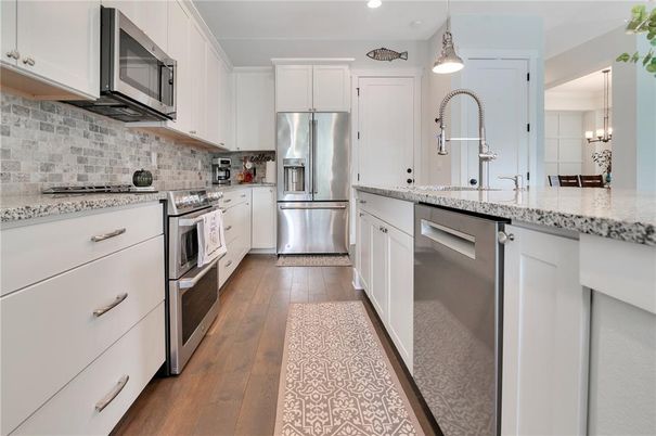 Interior, Kitchen, Pendant Lights, Recessed Lighting, Stainless Steel Appliances, Wood Texture Flooring