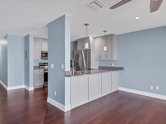 Interior, Kitchen, Pendant Lights, Recessed Lighting, Stainless Steel Appliances, Wood Texture Flooring