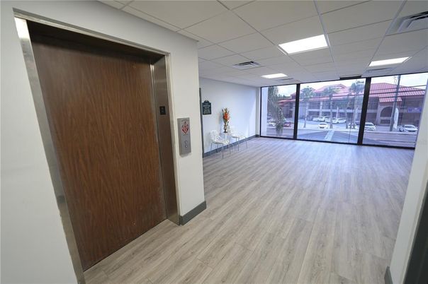 Elevator, Interior, Recessed Lighting, Wood Texture Flooring